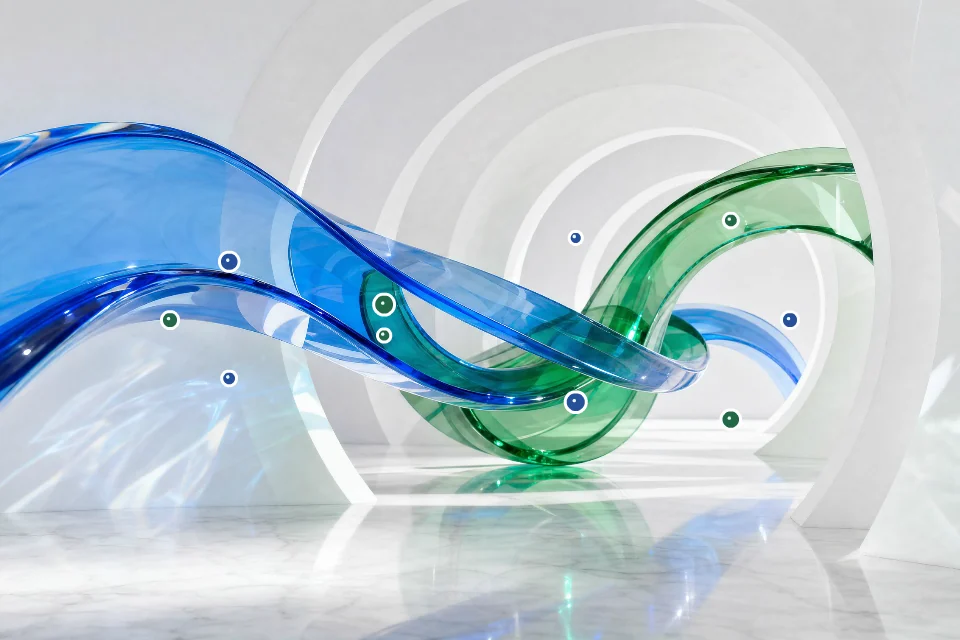 Abstract glass waves in blue and green create a dynamic art installation representing connection.