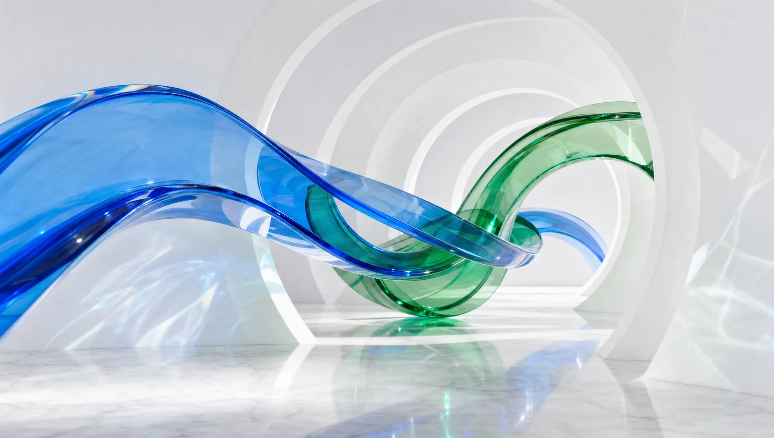 A blue and green glass sculpture curves elegantly on a reflective surface.